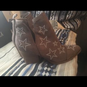 Carlos Santana ankle booties with studded stars